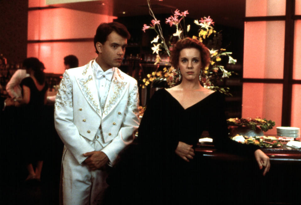 Elizabeth Perkins and Tom Hanks in a white suit