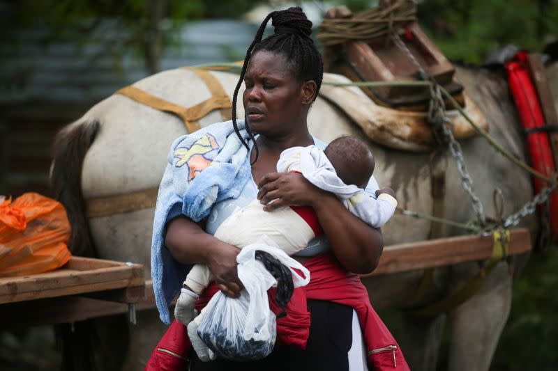 FILE PHOTO: Migrants journey north from Colombia, in Acandi