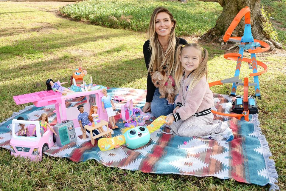 <p>Audrina Patridge and her daughter Kirra enjoy some outdoor time together with a variety of Mattel toys on Sunday in Beverly Hills. </p>