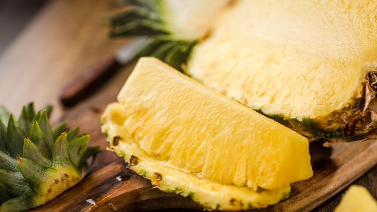 Sliced Pineapple on Chopping Board