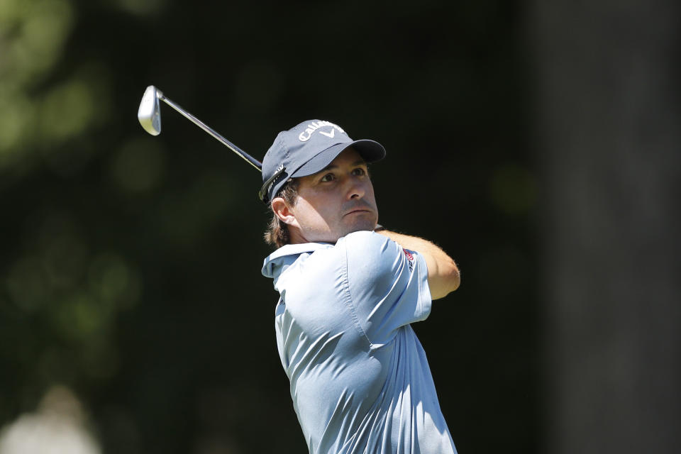 Kevin Kisner drives on the 11th tee during the final round of the Rocket Mortgage Classic golf tournament, Sunday, July 5, 2020, at Detroit Golf Club in Detroit. (AP Photo/Carlos Osorio)