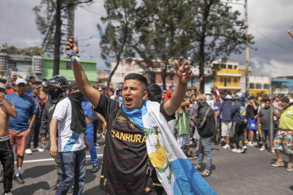 Demonstrators block a highway during a national strike, in Guatemala City, Tuesday, Oct. 10, 2023. People are protesting to support President-elect Bernardo Arévalo after Guatemala's highest court upheld a move by prosecutors to suspend his political party over alleged voter registration fraud. (AP Photo/Santiago Billy)
