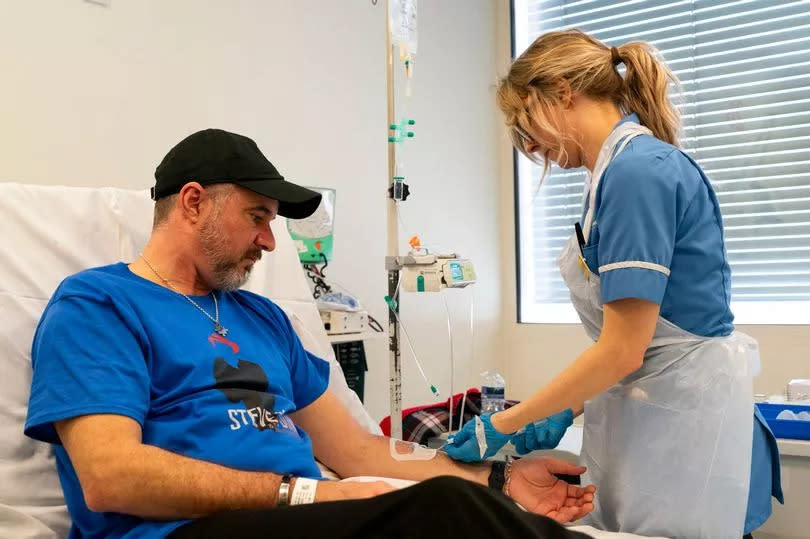 Patient Steve Young is administered infusion by nurse Eleanor Ferguson