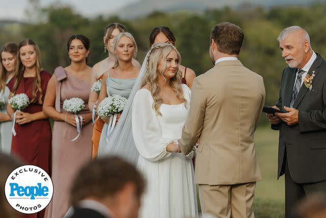 <p>Kayla Johnson Photography</p> (L-R) Maddie Grace Duggar and Jason Duggar at their Tennessee wedding on October 3, 2024.