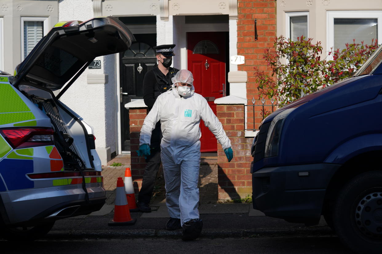 Forensic officers at the scene in Moore Street, Kingsley, Northampton following a discovery of a body in a rear garden. The remains are expected be taken to Leicester where they will be forensically examined by a Home Office pathologist but are believed to be that of a missing 42-year-old male. The investigation was mounted following the arrest of Fiona Beal, 48, at a hotel in Cumbria early on Wednesday morning. She has now been charged with murder. Picture date: Sunday March 20, 2022.