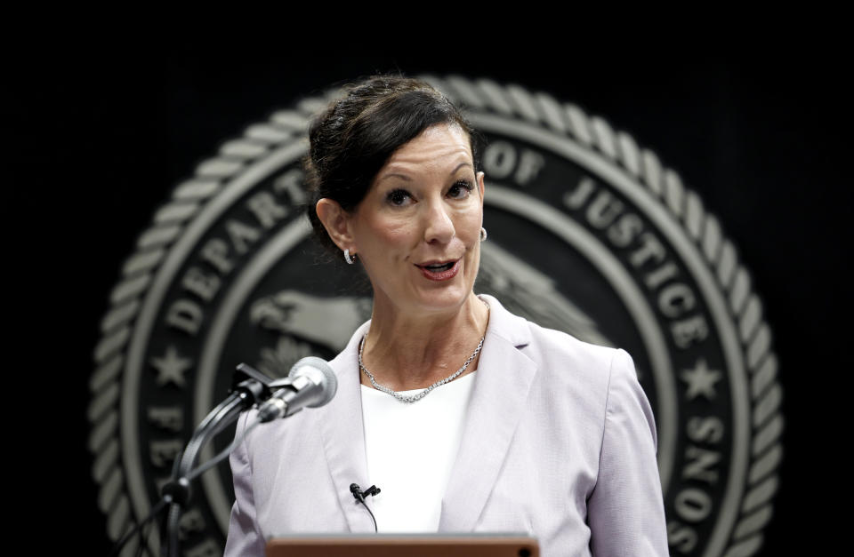 FILE - Colette Peters, director of the federal Bureau of Prisons, speaks after being sworn in at BOP headquarters in Washington, Tuesday, Aug. 2, 2022. A bipartisan group of U.S. senators introduced legislation Wednesday, Sept. 28, to overhaul oversight and bring greater transparency to the crisis-plagued federal Bureau of Prisons following reporting from The Associated Press that exposed systemic corruption in the federal prison system and increased congressional scrutiny. The bill is being introduced a day before Peters is scheduled to testify before the Senate Judiciary Committee. (Evelyn Hockstein/Pool Photo via AP, File)