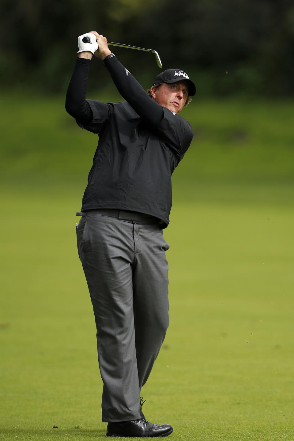 Phil Mickelson follows his shot from the fairway on the 12th hole during the second round of the Genesis Open golf tournament at Riviera Country Club, Saturday, Feb. 18, 2017, in the Pacific Palisades area of Los Angeles. (AP Photo/Ryan Kang)