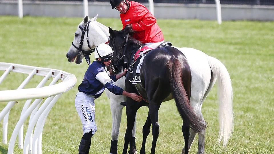 Ryan Moore checks Cliffsofmoher after the mishap. (Photo by Michael Dodge/Getty Images)