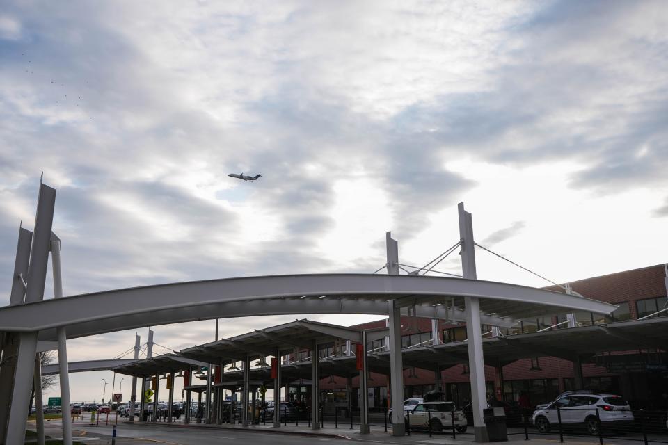 A plane takes off at the Des Moines International Airport on Monday.
