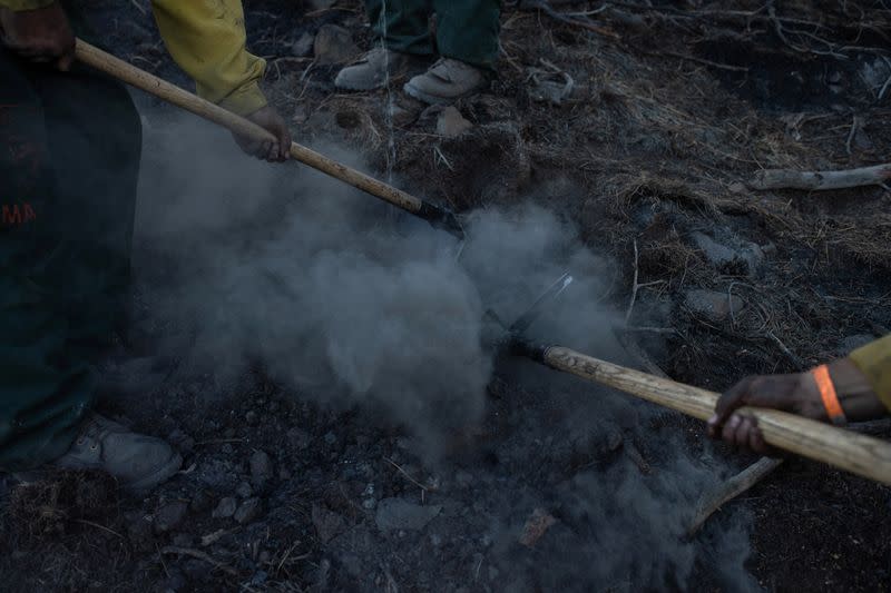 The Wider Image: Oregon inmates find redemption in fighting wildfires