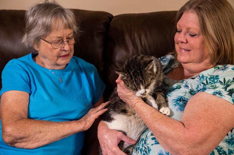 Beverly Roberts and Mary Alston pet Big Boy at Alston’s home in Wetumpka, Ala., on Thursday, Sept. 29, 2022.