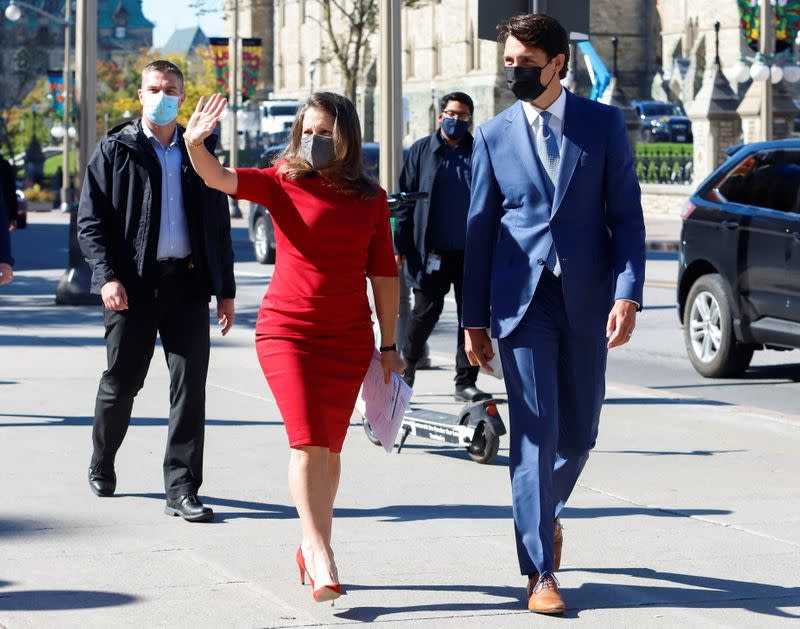 Canada's Deputy Prime Minister and Minister of Finance Chrystia Freeland, and Canada's Prime Minister Justin Trudeau leave a news conference in Ottawa