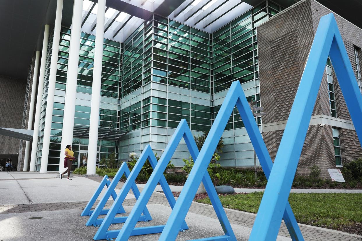 A sculpture in front of the Thomas G. Carpenter library building on the UNF campus. A new bill proposed by the state Board of Governors would require post-tenure faculty review for all public universities.