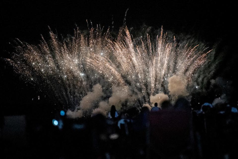 A fireworks display caps off Battle Creek's Field of Flight Air Show & Balloon Festival on Sunday, July 4, 2021 at Kellogg Executive Airport. 