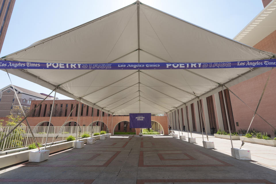 A poetry stage is prepared for the upcoming The Los Angeles Times Festival of Books, a free public festival held annually at the University of Southern California campus, in Los Angeles, Tuesday, April 16, 2024. University of Southern California officials have canceled a commencement speech by its 2024 valedictorian, a pro-Palestinian Muslim, citing "substantial risks relating to security and disruption" of the event that draws 65,000 people to campus. (AP Photo/Damian Dovarganes)