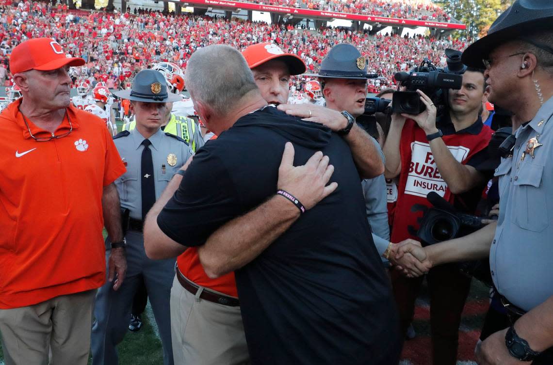 Clemson head coach Dabo Swinney talks with N.C. State head coach Dave Doeren after the Wolfpack’s 24-17 victory over Clemson at Carter-Finley Stadium in Raleigh, N.C., Saturday, Oct. 28, 2023. Ethan Hyman/ehyman@newsobserver.com
