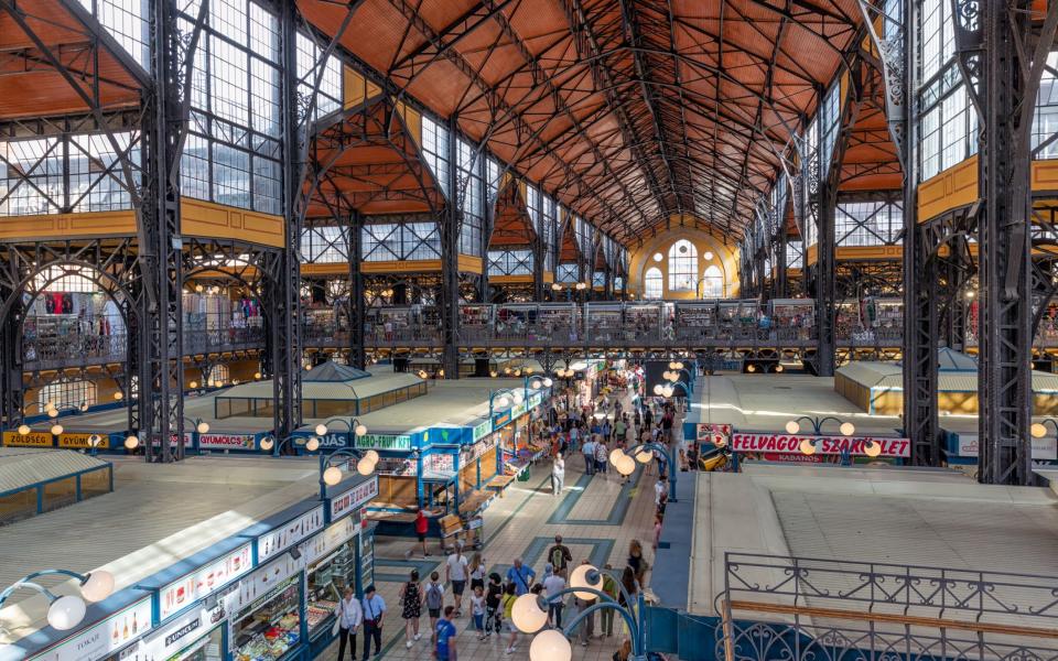 The Great Market Hall, a 19th-century temple to industrial design, sits at the heart of the city's cultural life