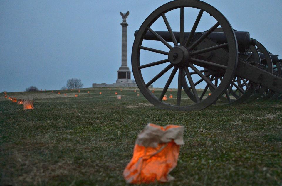 Luminarias burn as darkness falls on the Antietam National Battlefield near Sharpsburg during the 2018 event. The 2021 illumination is to start at 6 p.m. Saturday, Dec. 4.