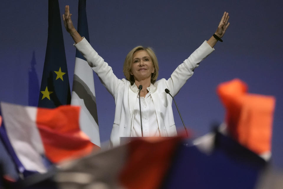 Valerie Pecresse, candidate for the French presidential election 2022, waves after delivering a speech during a meeting in Paris, France, Saturday, Dec. 11, 2021. The first round of the 2022 French presidential election will be held on April 10, 2022 and the second round on April 24, 2022. (AP Photo/Christophe Ena)