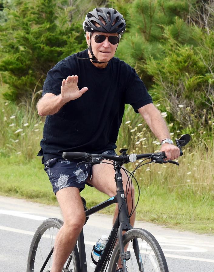 President Joe Biden, on vacation in Rehoboth Beach, rides a bike on the Gordon’s Pond Trail to Herring Point in Lewes on Thursday, August 3, 2023.