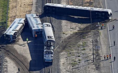 An aerial view shows the scene of a double-decker Metrolink train derailment in Oxnard, California February 24, 2015. REUTERS/Lucy Nicholson