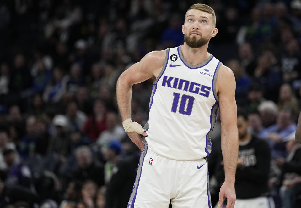 Sacramento Kings forward Domantas Sabonis (10) looks on during the first half of an NBA basketball game against the Minnesota Timberwolves, Monday, Jan. 30, 2023, in Minneapolis. (AP Photo/Abbie Parr)