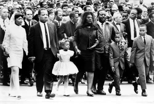 The family of Dr. Martin Luther King, Jr. walk in the funeral procession of the slain civil rights leader on April 9, 1968. (File photo)