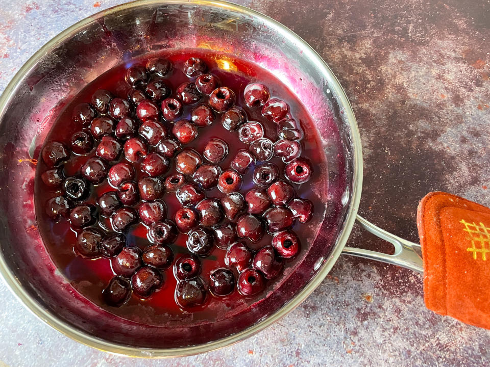 In natural light, the flames dancing over the cherries can be hard to see. (Photo: Jenny Kellerhals)