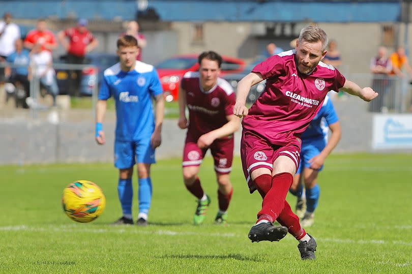 Ally Martin slots home the winning penalty for Shotts -Credit:Gavin Campbell