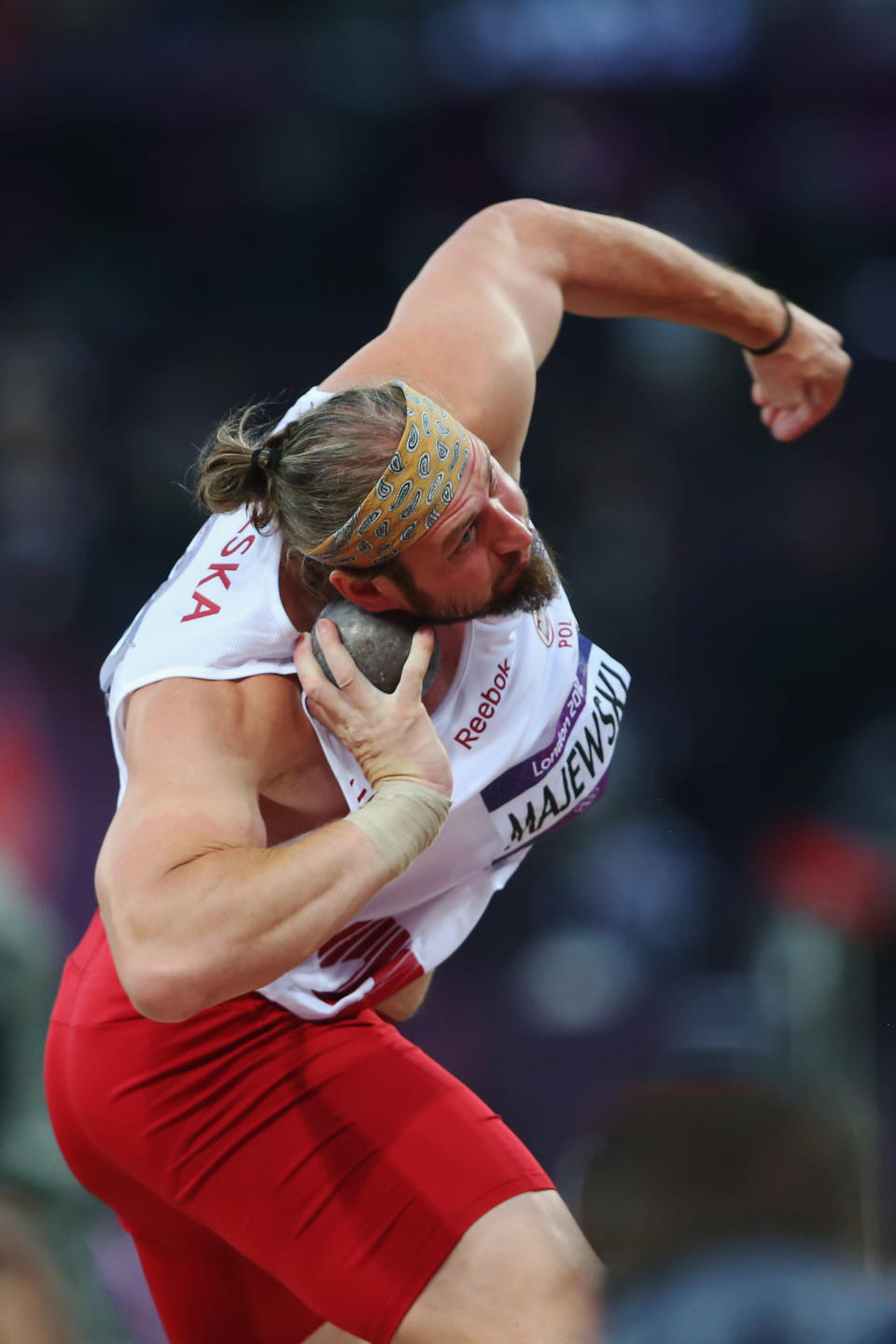 LONDON, ENGLAND - AUGUST 03: Tomasz Majewski of Poland competes in the Men's Shot Put Final on Day 7 of the London 2012 Olympic Games at Olympic Stadium on August 3, 2012 in London, England. (Photo by Alexander Hassenstein/Getty Images)