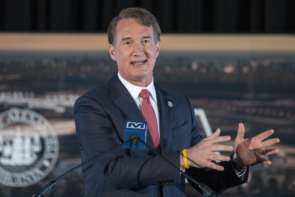 FILE - Virginia Gov. Glenn Youngkin speaks at an event in Alexandria, Va, on Dec. 13, 2023. Virginia's governor signed a law Thursday, April 18, 2024, that allows the state's colleges and universities to directly pay athletes through name, image and likeness deals. The law signed by Gov. Glenn Youngkin bypasses an NCAA rule that prevents schools from paying athletes under NIL guidelines.(AP Photo/Alex Brandon, File)