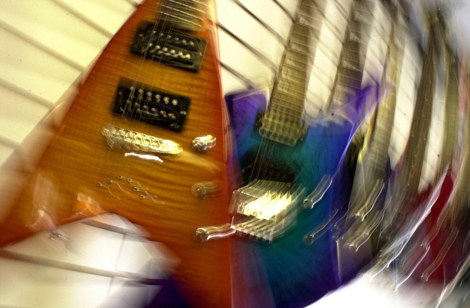 Instruments pictured at Raritan Bay Guitar Repair in Freehold in 2005.