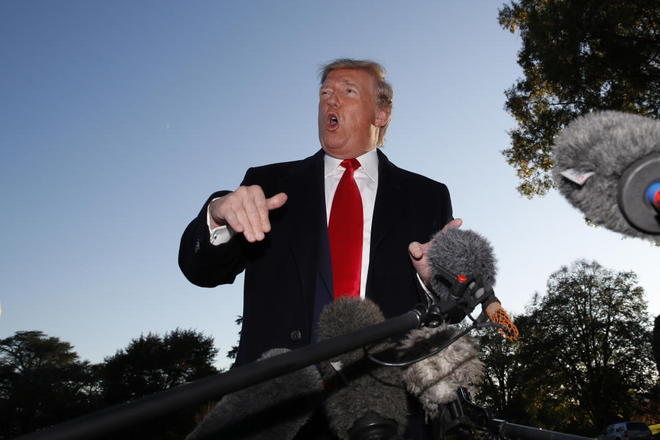 President Donald Trump speaks with reporters as he departs on the South Lawn of the White House, Friday, Nov. 1, 2019, in Washington. (AP Photo/Alex Brandon)