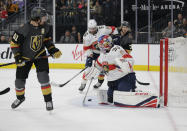 Florida Panthers goaltender Sam Montembeault (33) blocks the puck during the second period of the team's NHL hockey game against the Vegas Golden Knights on Saturday, Feb. 22, 2020, in Las Vegas. (AP Photo/Marc Sanchez) ///