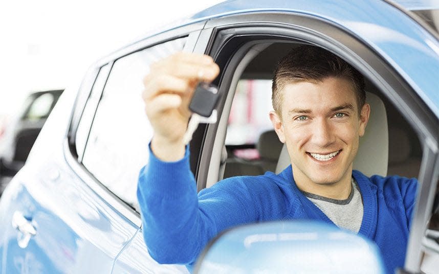 man in car  - Alamy