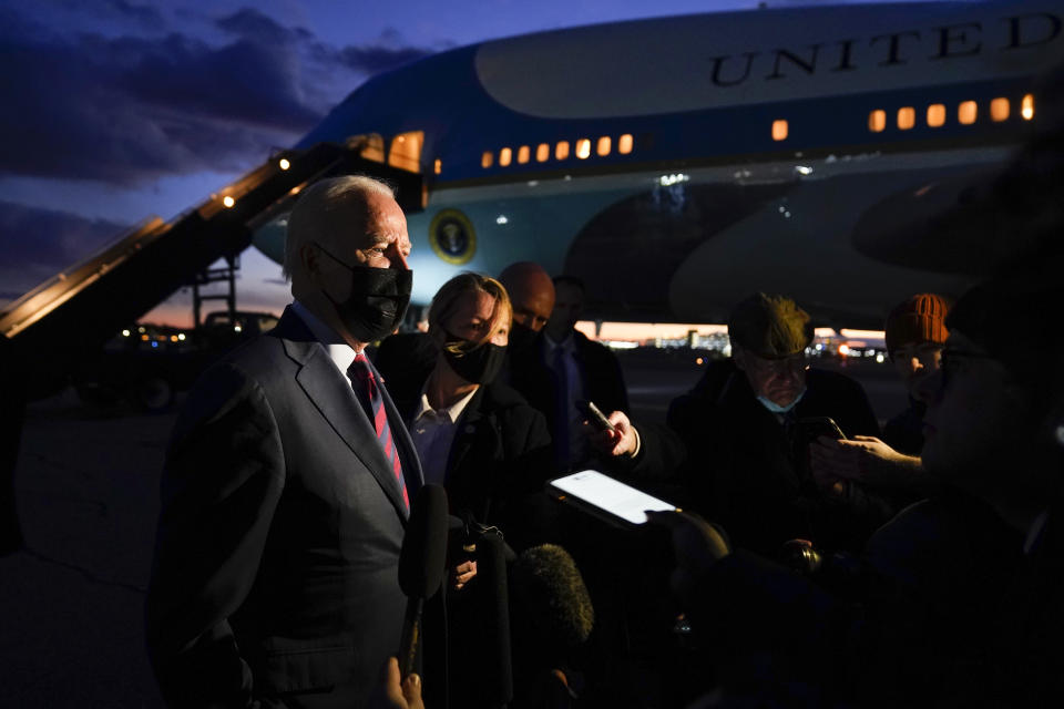 President Joe Biden speaks to reporters as he prepares to depart Manchester-Boston Regional Airport, Tuesday, Nov. 16, 2021, in Manchester, N.H. (AP Photo/Evan Vucci)