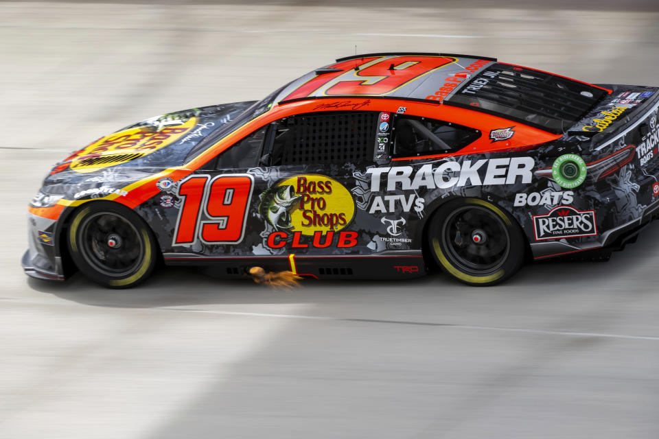 Martin Truex Jr. (19) races into turn 3 during the NASCAR 400 auto race at Dover Motor Speedway Monday, May 1, 2023, in Dover, Del. (AP Photo/Jason Minto)