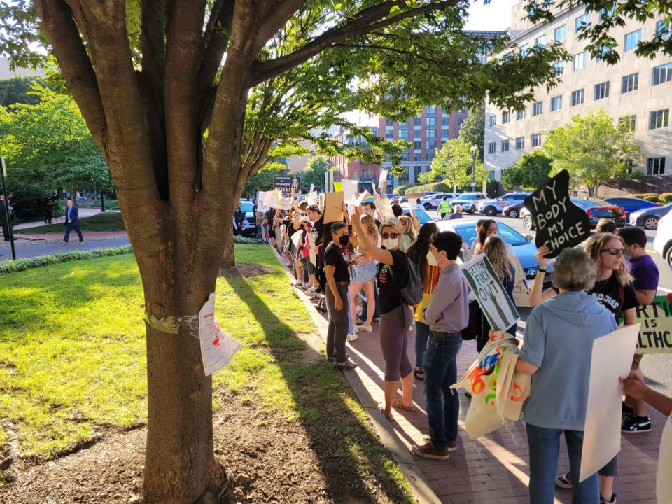 Protesters heckle GOP senators outside of the National Building Museum (John Bowden)