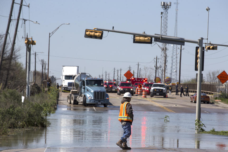 High water from a water main break floods Clinton Drive just east of the East Loop 610 on Thursday, Feb. 27, 2020 in Houston. The flooding closed the major freeway that circles the city. ( Brett Coomer/Houston Chronicle via AP)