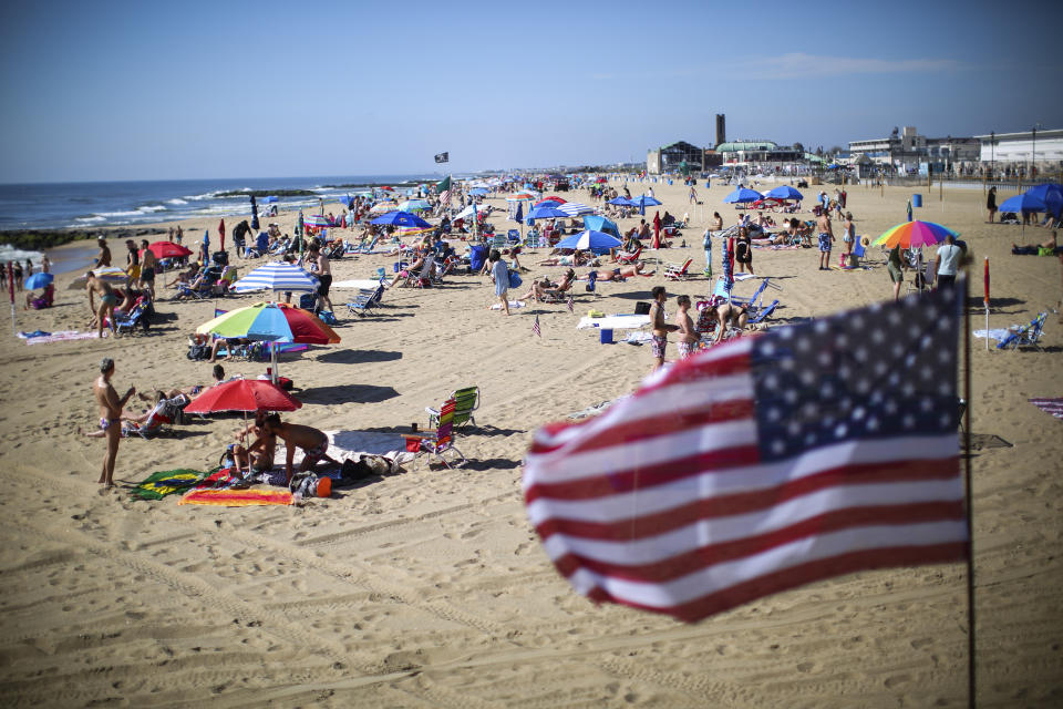 ASBURY PARK, NJ - MAY 26:  People visit the beach during Memorial Day weekend on May 26, 2019 in Asbury Park, New Jersey. Memorial Day is the unofficial start of summer and this year New Jersey has banned smoking and vaping on nearly every public beach under tougher new restrictions. (Photo by Kena Betancur/Getty Images)