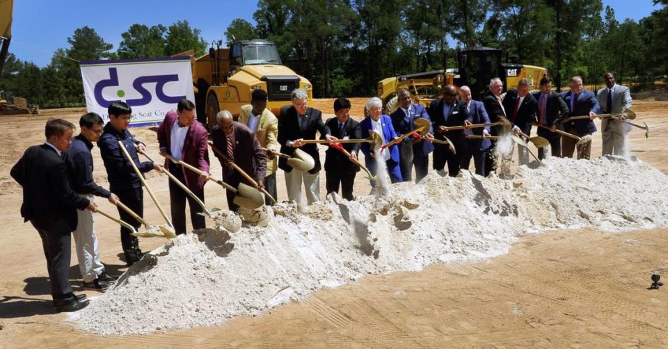 Officials do a ceremonial groundbreaking Thursday for the expansion of the Daechang Seat Corp., USA manufacturing facility in Phenix City, Alabama. 05/12/2022