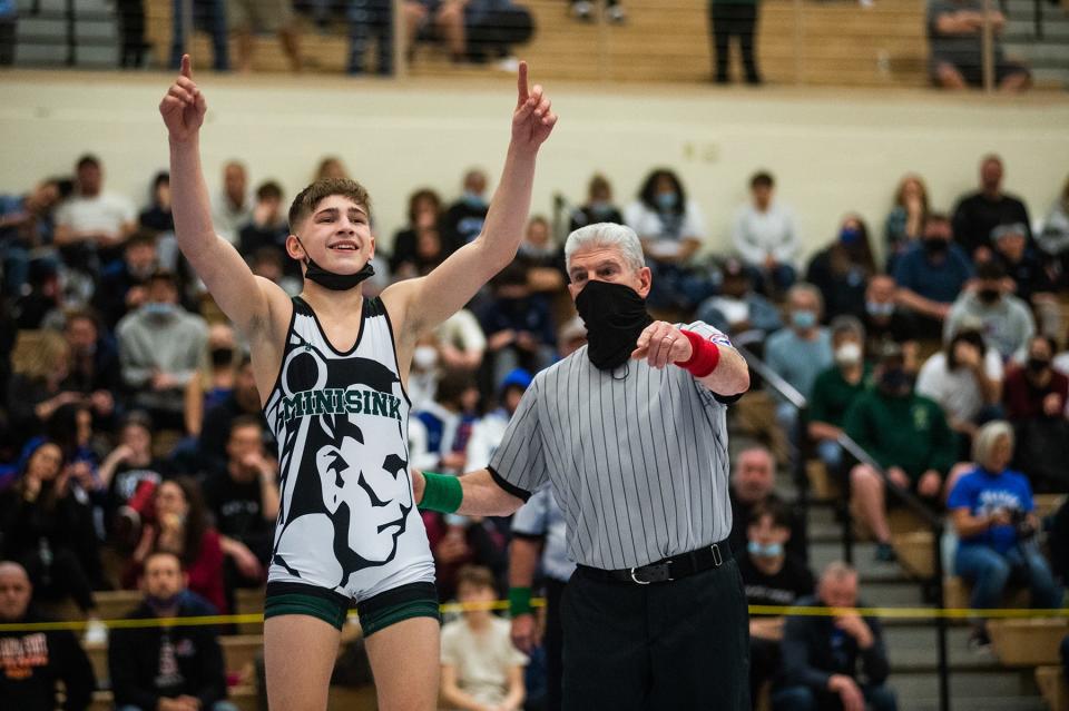 Minisink Valley's Anthony Tresch, left, wins his match in the 126 pound weight class during the Section 9 Division 1 wrestling championships at Monroe-Woodbury High School in Central Valley, NY on Saturday, February 12, 2022. KELLY MARSH/FOR THE TIMES HERALD-RECORD