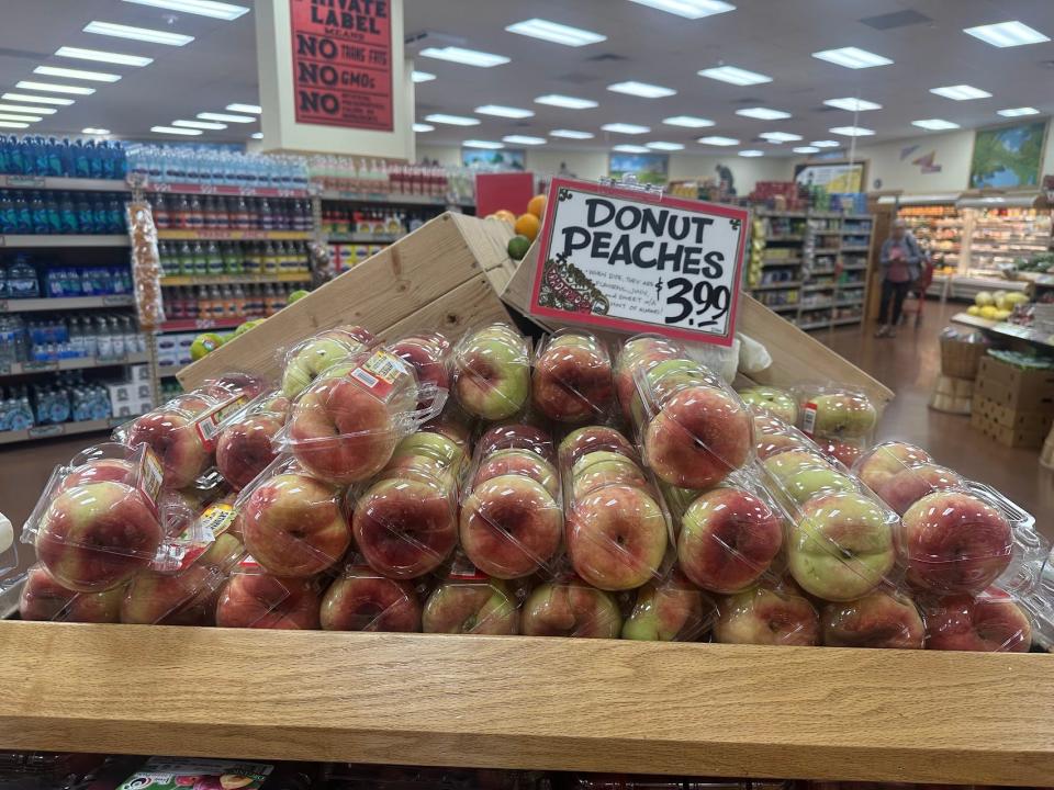 Donut peaches on display at Trader Joe's in three packs