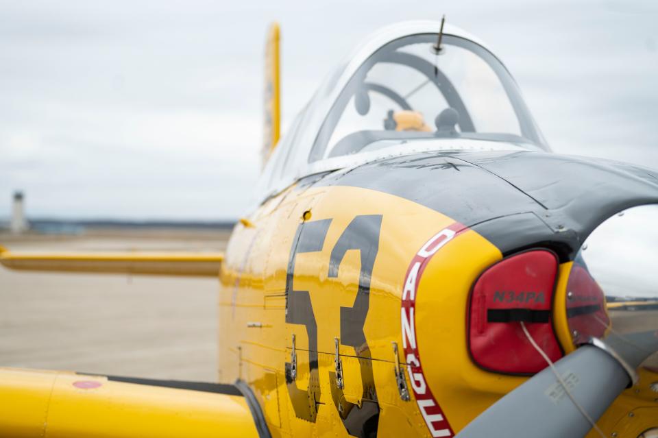 A T-34 aircraft owned by the Hooligans Flight Team sits on the tarmac at Western Michigan University's College of Aviation in Battle Creek on Friday, Dec. 2, 2022.