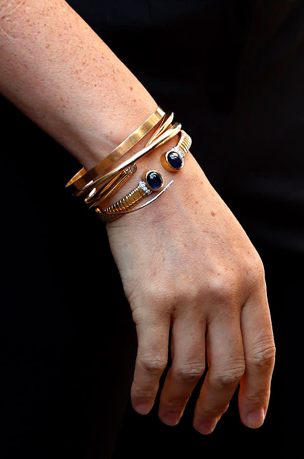 Meghan Markle wore jewellery from her late mother-in-law Princess Diana's collection, as well as a gold bangle by Pippa Small [Photo: Getty Images]