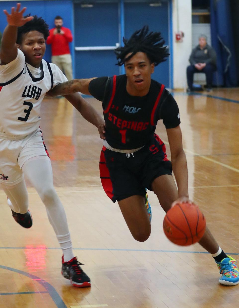 Stepinac's Boogie Fland (1) during game against Long Island Lutheran in the New York State Federation Tournament championship at Shaker High School in Latham March 26, 2023.
(Credit: Frank Becerra Jr./The Journal News)
