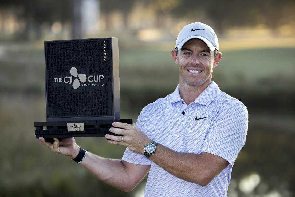 Rory McIlroy, of Northern Ireland, holds the winning trophy after the final round of the CJ Cup golf tournament Sunday, Oct. 23, 2022, in Ridgeland, S.C. (AP Photo/Stephen B. Morton)