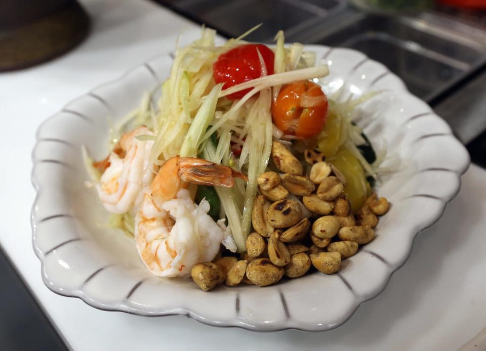 Som Tum Thai is a very popular dish in northeastern Thailand, according to May Sonta. Served at Five 81° NE in Portsmouth, it has green papaya, shrimp, green beans, cherry tomatoes, roasted peanuts and chili garlic lime dressing.