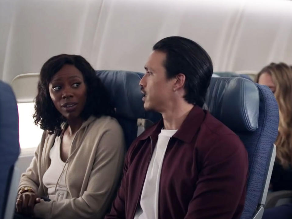 couple sitting on a plane