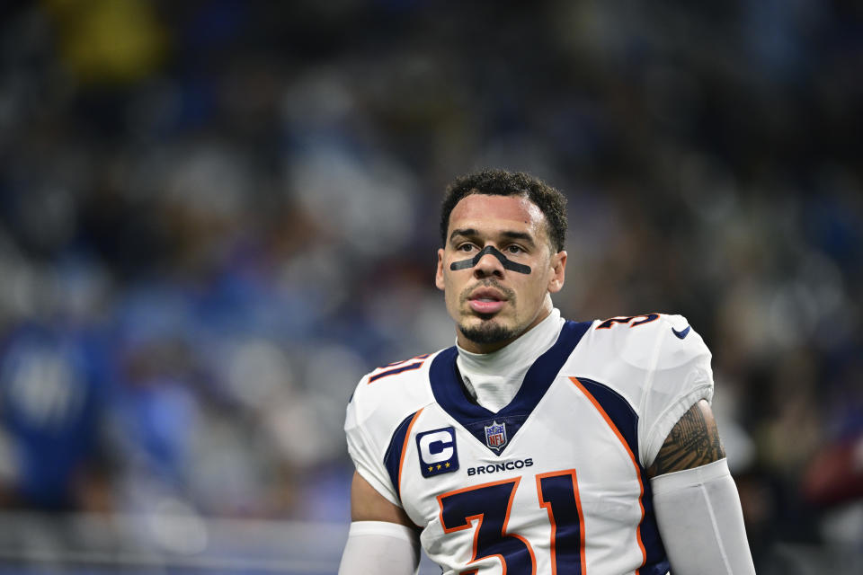 FILE - Denver Broncos safety Justin Simmons is seen during warmups before an NFL football game against the Detroit Lions, Saturday, Dec. 16, 2023, in Detroit. The Denver Broncos are releasing safety Justin Simmons in the fallout from the Russell Wilson separation, a person familiar with the move told The Associated Press on Thursday, March 7, 2024. (AP Photo/David Dermer, File)